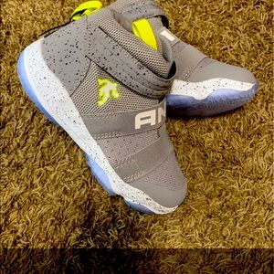 Boys And1 shoes size 2 , great for basketball .